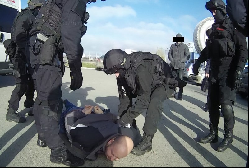 cybercrimimal arrest photo